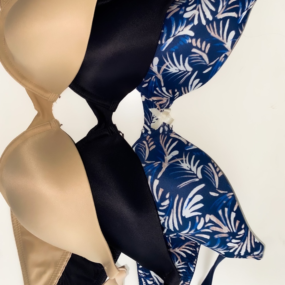 nude, black, and navy tropical floral bras